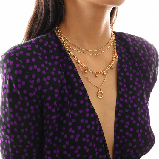 สร้อยคอผู้หญิง หลายชั้น แฟชั่นหรู สีทอง/เงิน. Women’s Multi-Layer Necklace – Elegant Gold & Silver Fashion Jewelry